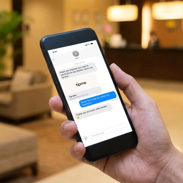 Phone showing a text conversation in which Alex sends a tipme tip link and the guest says thanks